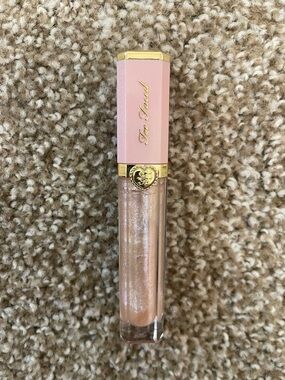 Too Faced Iridescent Pink Shimmer Lip Gloss in color Pants off, Dance off